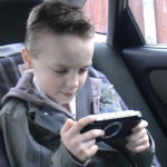 Child who took part in the experiment playing on PSP before the ban. ©BBC