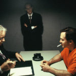 Investigadores interrogan a Darcell. ©New Dominion Pictures, LLC